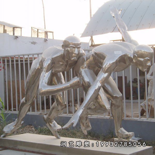 企业不锈钢滑冰人物雕塑