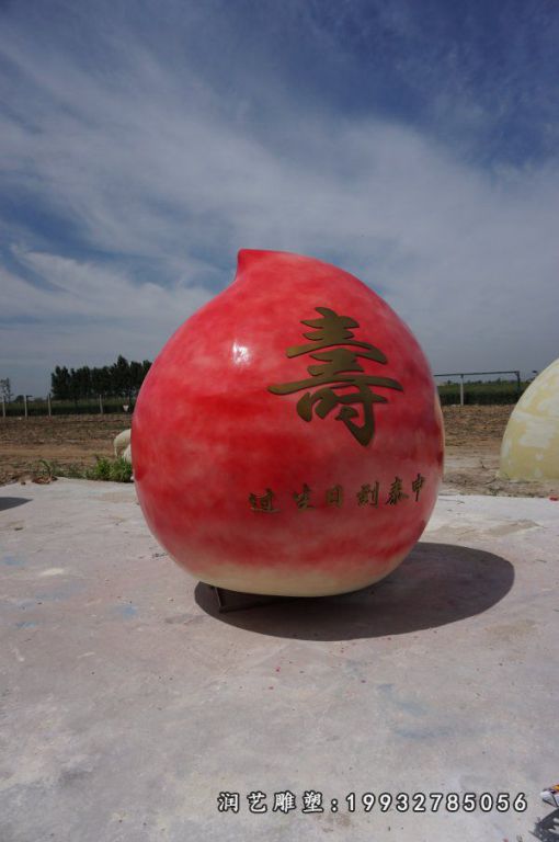 商业街玻璃钢桃雕塑